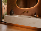 Bespoke floating tiled basin, cream marble effect porcelain, 45 degree angle view, arched terracotta bathroom, brass tap — Jack the Tiler Studio