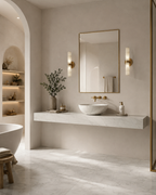 Bespoke tiled vanity worktop with round vessel basin, marble effect porcelain, wide bathroom view with archway to freestanding bath — Jacko